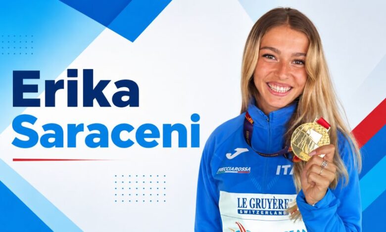 Erika Saraceni holding a gold medal in Italian athletics uniform