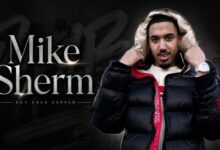 Mike Sherm rapper portrait with black background and name text